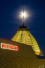 The full moon behind the dome of the Mediterraneo