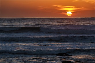 Waves at sunset on the Atlantic Ocean