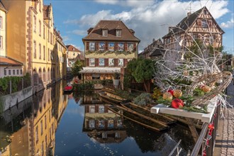 Little Venice with street decorations during Christmas time in the town of Colmar. Alsace