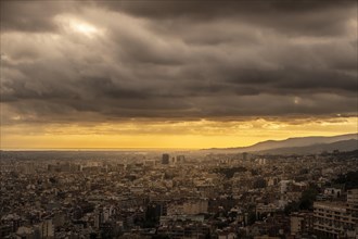 Sunset in the city of Barcelona from an aerial view