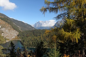 View of the Zugspitze massif with Blindsee lake in autumn