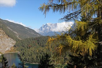 View of the Zugspitze massif with Blindsee lake in autumn