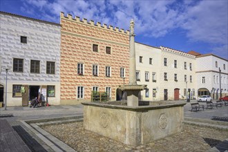 Historical houses and fountains on the main square of