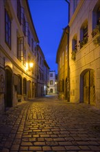 Alley in the old town in the evening