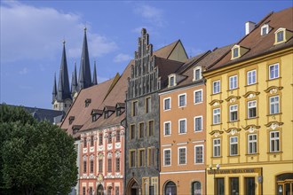 Historic houses on the main square and church towers of St. Nicholas and St. Elisabeth Church