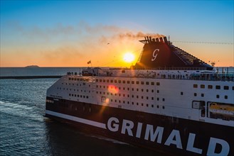 Grimaldi Lines Cruise Ship at sunset in Port of Livorno