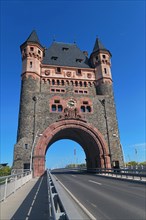 Historical cultural monument tower landmark called Nibelungenbruecke or Nibelungentor on bridge in city Worms in Germany