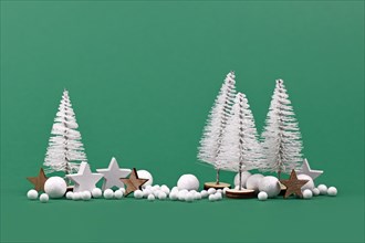 Christmas arrangement with white miniature Christmas trees