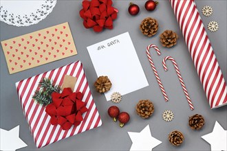 Seasonal Christmas holiday flat lay with concept for children letter to Santa Claus with white empty letter