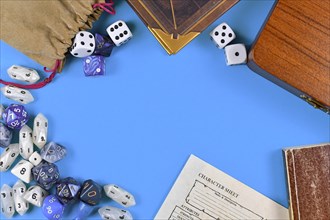 Flat lay concept design for tabletop role playing with blue and white RPG dices