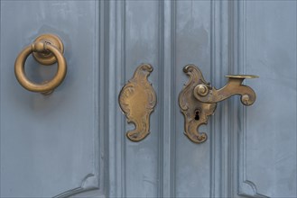 Historic brass door lock and knocker