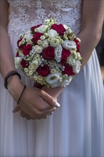Bride holding her bridal bouquet