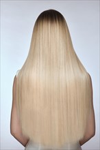 Close-up of shiny smooth blond hair