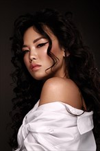 Beautiful asian woman in white shirt