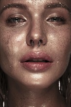 Portrait of a girl with emotion on her face. Photo taken in studio