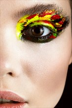 Colorful make-up on close-up eye. Art beauty image