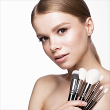 Beautiful young girl with a light natural make-up