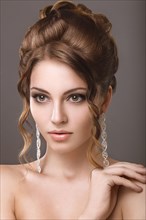 Portrait of a beautiful woman in the image of the bride