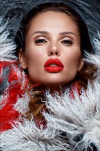 Beautiful woman with classic holiday make-up