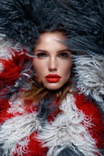Beautiful woman with classic holiday make-up