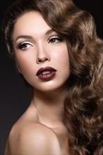 Beautiful woman with evening make-up and long hair