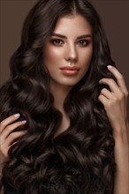 Beautiful brunette model with curls