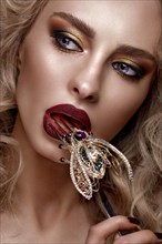 Beautiful blonde girl with curls