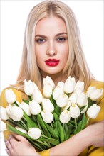 Portrait of beautiful fashion model with bouquet lily in hands