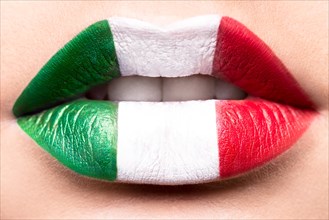 Female lips close up with a picture flag of Italy. Green