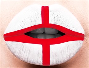 Female lips close up with a picture of the flag of England. white