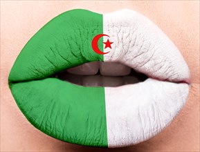Female lips close up with a picture of the flag of Algeria. white