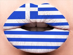 Female lips close up with a picture of the flag of Greece. white