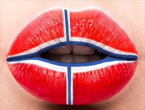 Female lips close up with a picture of the flag of Denmark. white