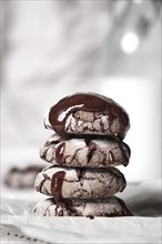 Crispy chocolate chip cookies on wooden background in vintage style