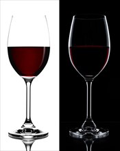 Red wine in a glass isolated on black and white background