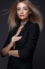 Beautiful woman with evening make-up and long straight hair
