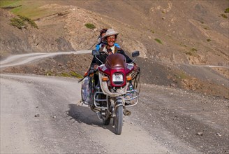 Couple on a motorbike along the southern route into Western Tibet