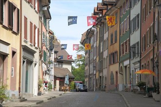 Street and houses with flags decoration