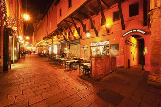 Restaurant in the pedestrian zone with Christmas lights