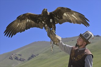Kyrgyz hunter with Golden Eagle