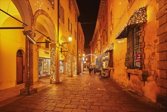 Arcades in the pedestrian zone with Christmas lights