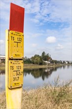Sign about the course of a gas pipeline on the Elbe