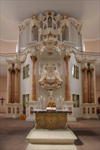 Interior view with organ and chancel of the baroque parish church