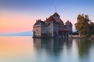 Chillon Castle at dusk on Lake Geneva in the canton of Vaud