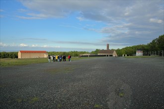 Visitor group in concentration camp