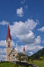 Assumption of the Virgin Mary Parish Church with St. Sebastian Chapel in Holzgau in the Lech Valley