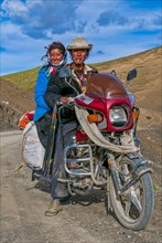 Couple on a motorbike along the southern route into Western Tibet