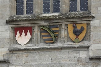 Three coats of arms