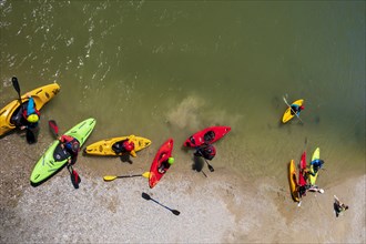 Kayakers at the Marienbruecke over the Isar