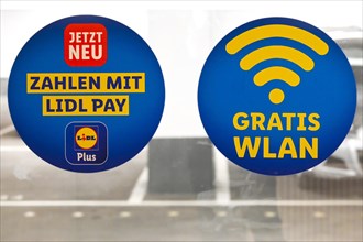 Lidl pay lettering and free wifi